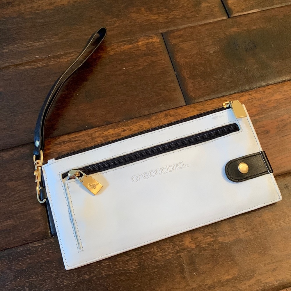 One Odd Bird Zip Clutch White Leather with Black Trim and Gold Hardware